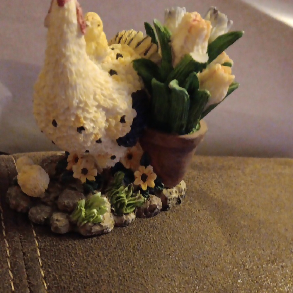 Charming Chicken Figurine with Floral Accents